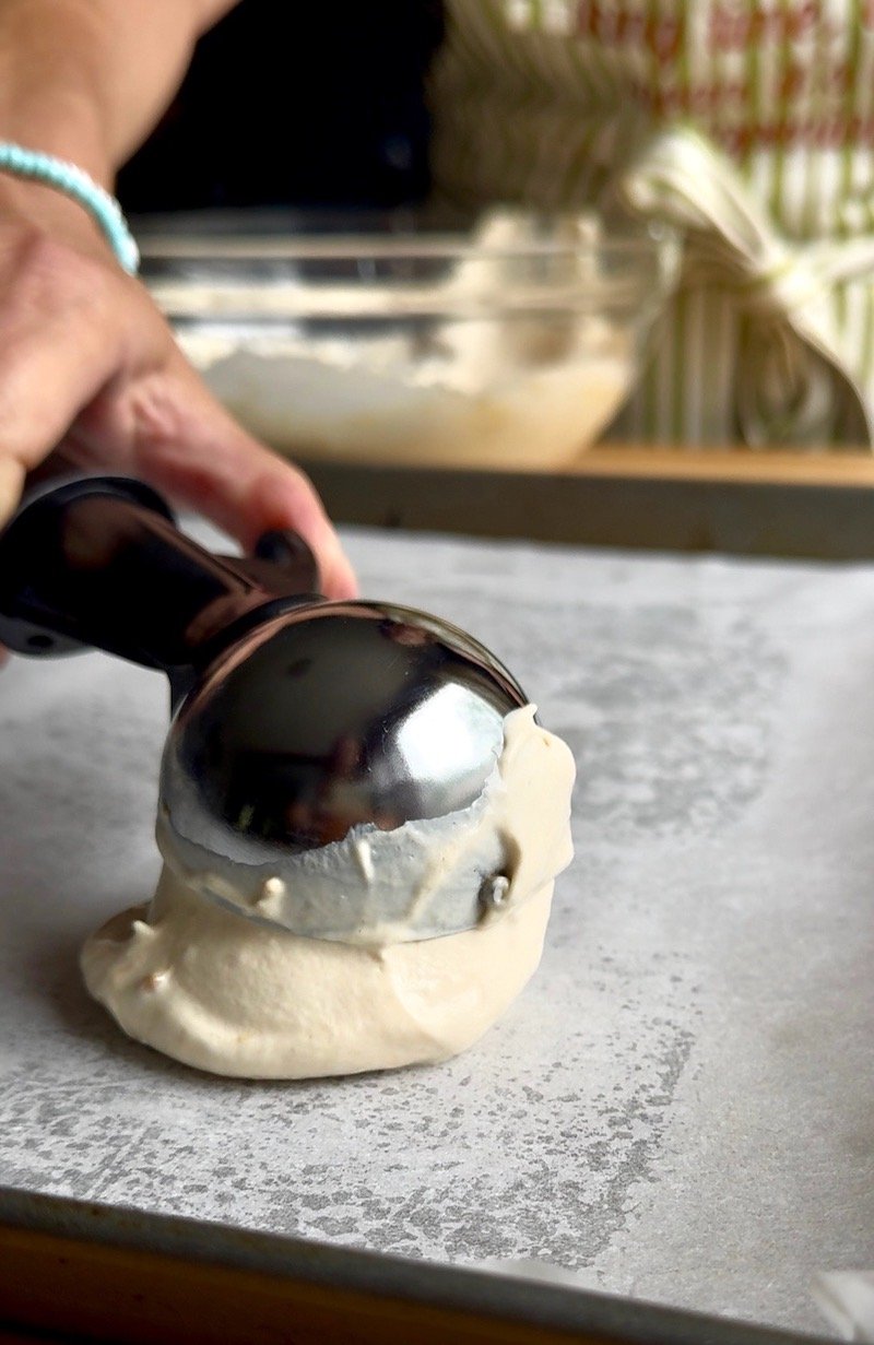 scooping homemade Yasso bars onto parchment paper - 12 weight watchers points