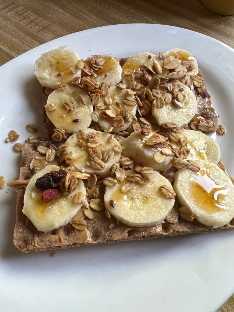 this is a snack of wasa crackers with peanut butter and banana